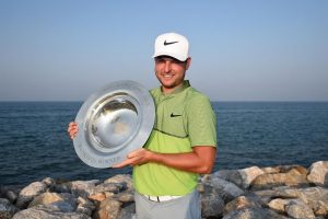MUSCAT, OMAN - NOVEMBER 05:  Jordan Smith of England poses with the Road to Oman Rankings trophy on day four of the NBO Golf Classic Grand Final at Al Mouj Golf on November 5, 2016 in Muscat, Oman.  (Photo by Tom Dulat/Getty Images)